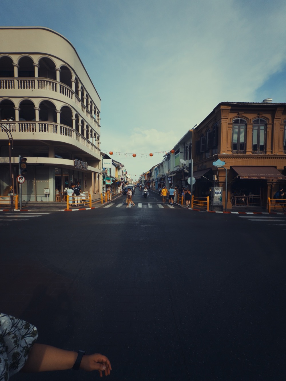 Old town street lined with colonial-style buildings